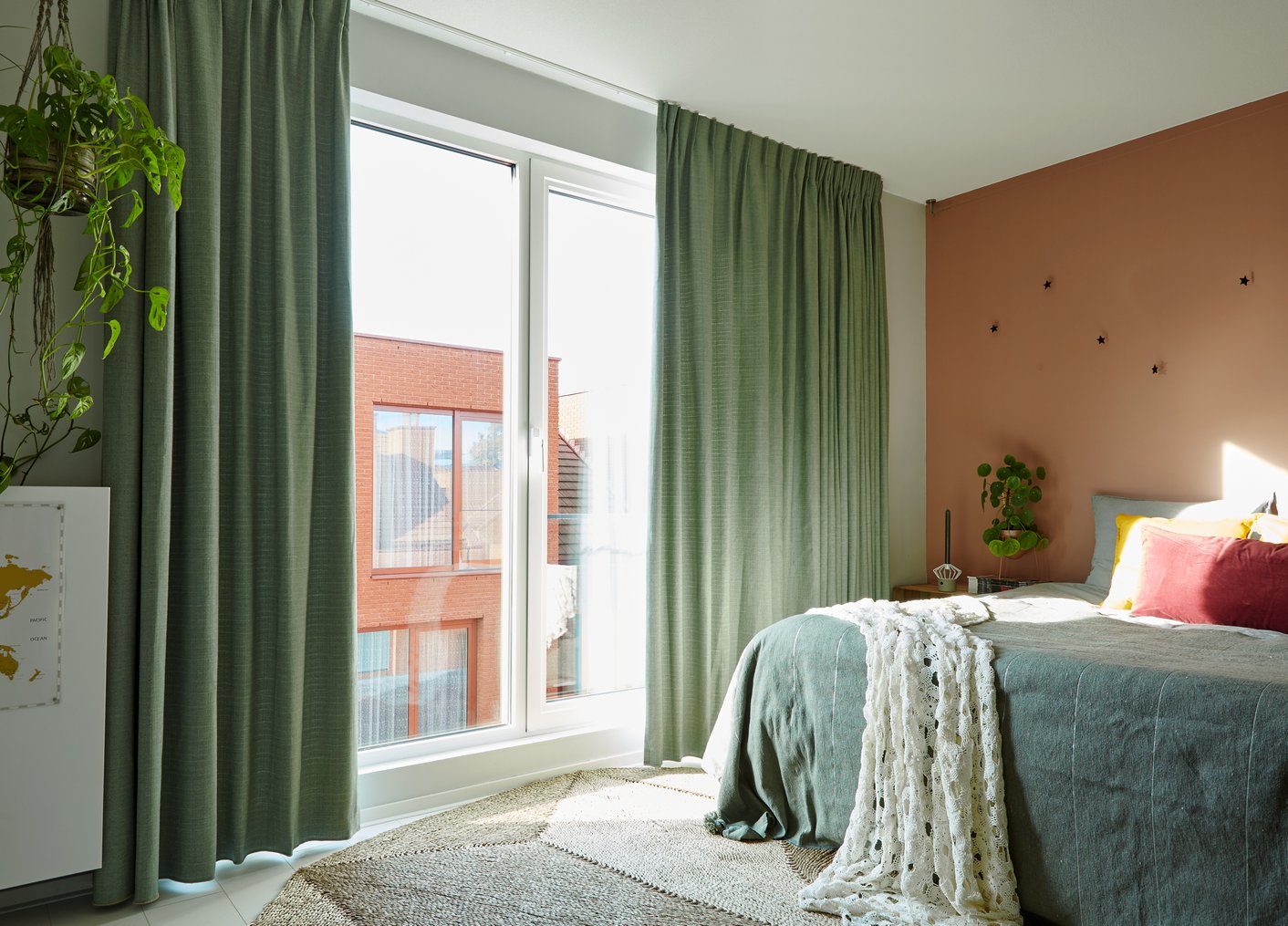 Groene overgordijnen slaapkamer