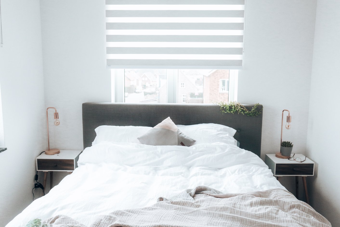 Duo rolgordijnen in de slaapkamer