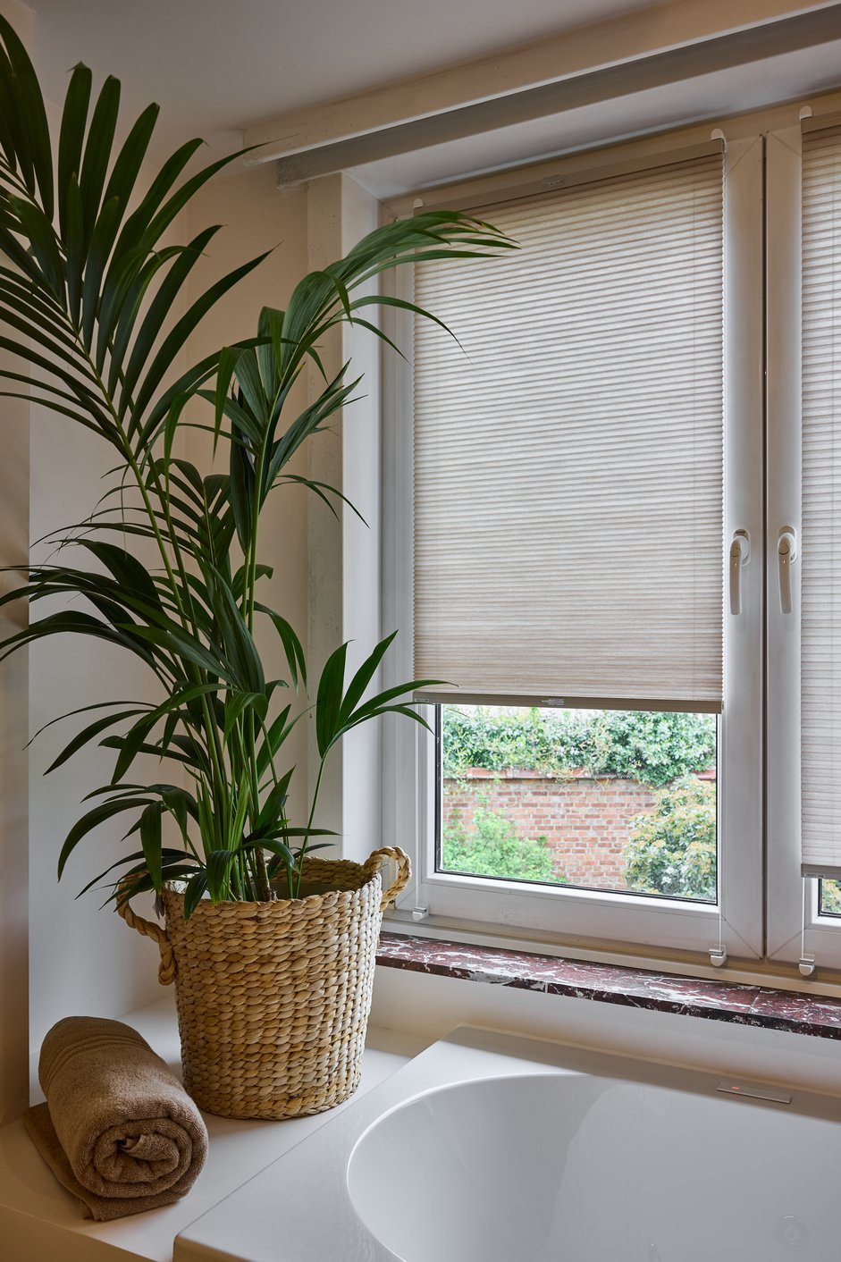 Plisségordijn in de badkamer